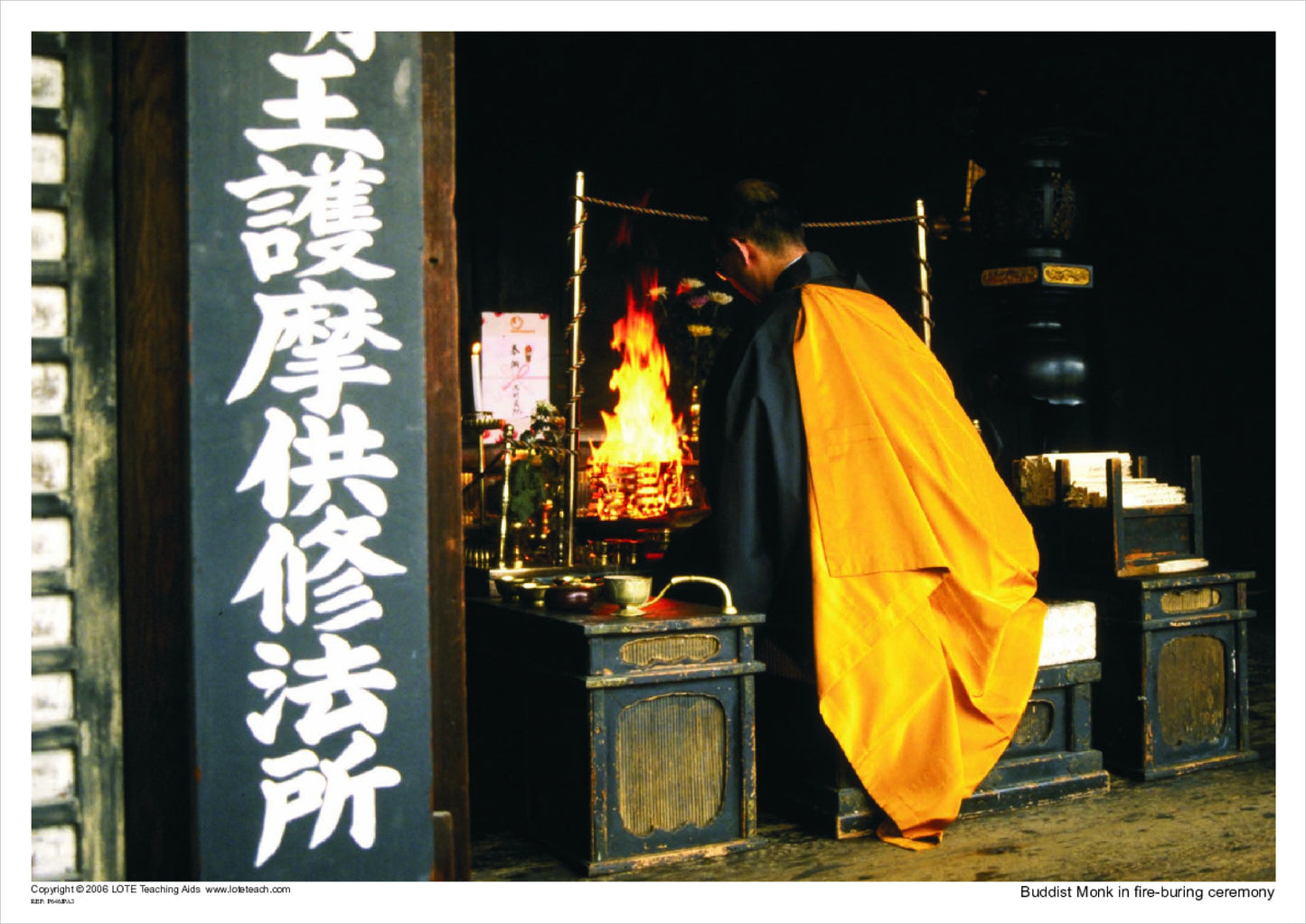 Buddist Monk in fire-burning ceremony
