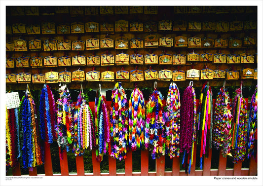 Paper cranes and wooden amulets